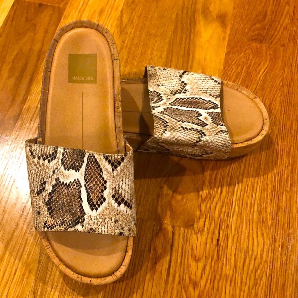 Snake skin print tan and black wedge sandals.
